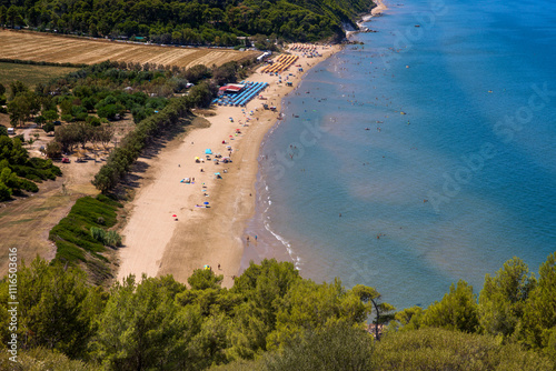 Fototapeta Naklejka Na Ścianę i Meble -  Panorama of Calenelle beach, in Puglia, Italy. It is a tourist destination in Gargano overlooking the Adriatic Sea.