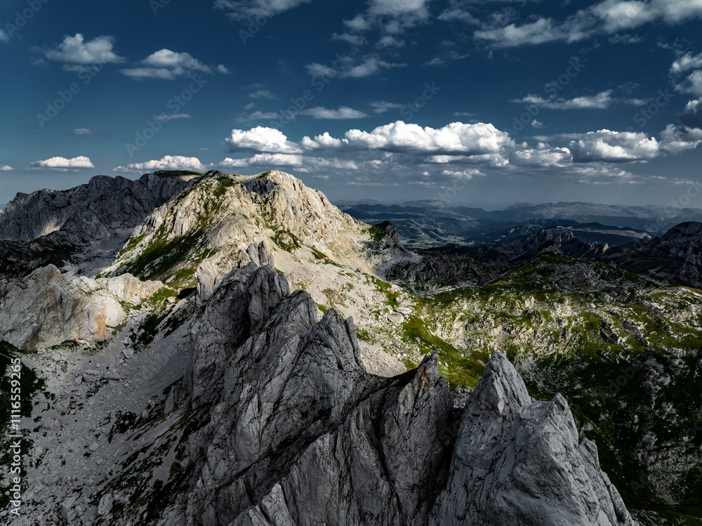 aerial view on mountain range in durmitor mountains with clouds