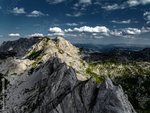 Obraz na płótnie aerial view on mountain range in durmitor mountains with clouds w salonie