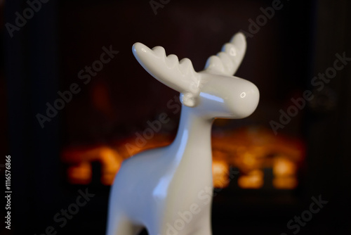 A Stylish White Moose Figurine Perfectly Positioned Against a Beautifully Cozy Background
