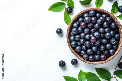 Nutritious Acai Berries on Crisp White Canvas â€“ A Top View Delight