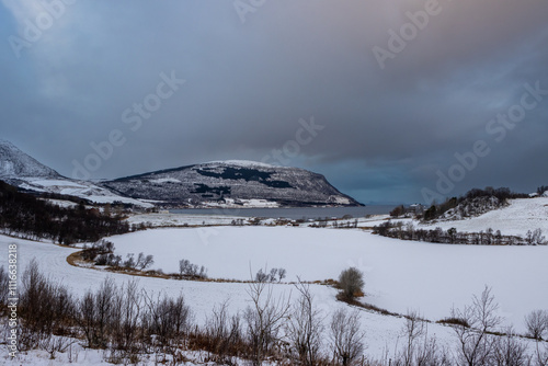 Snowy landcape with mountains, Harstad, Norway photo