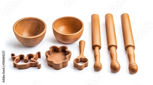 Wooden bowls, rolling pins, and cookie cutters isolated on white. photo