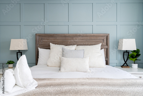 Cozy modern master bedroom with accent wall of a rental property.