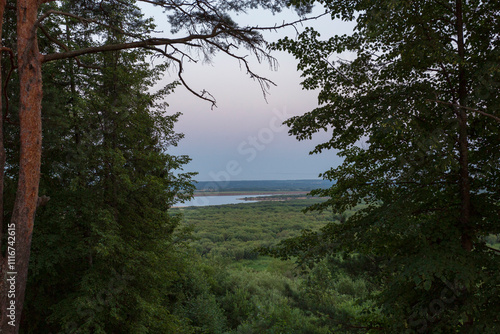 northern summer landscape, view from the hill to the meadow and river