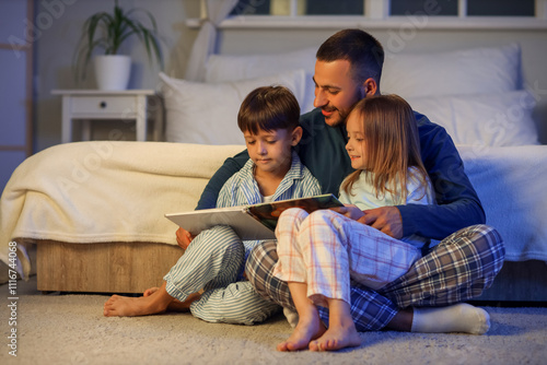 Father reading bedtime stor...