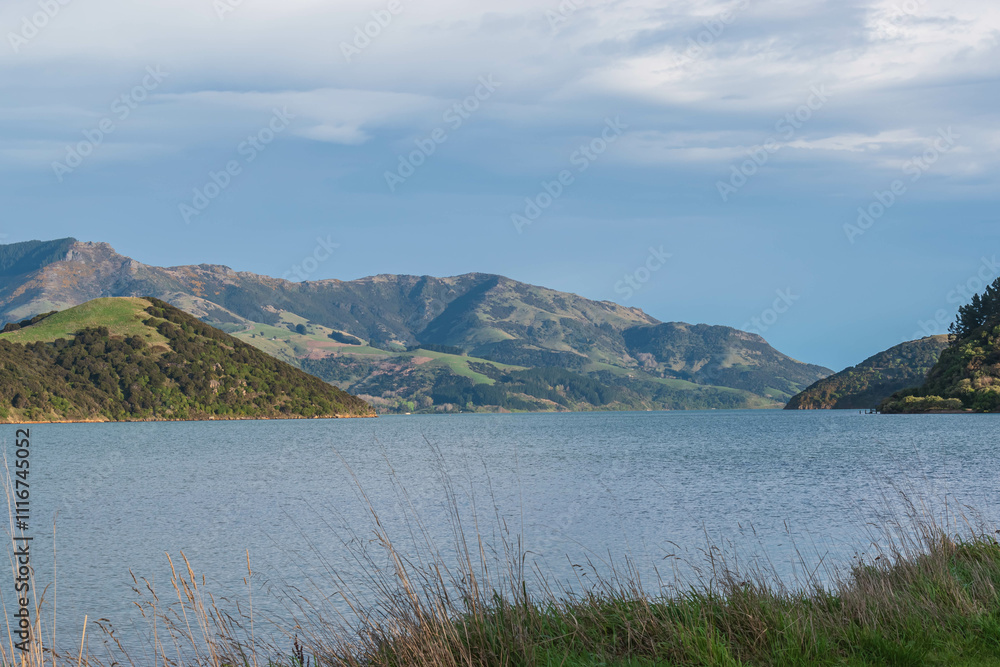 Fototapeta premium Majestic Mountain Range Reflected in Calm Lake Waters