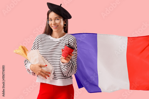 Young woman with baguettes and coffee against flag of France on pink background photo