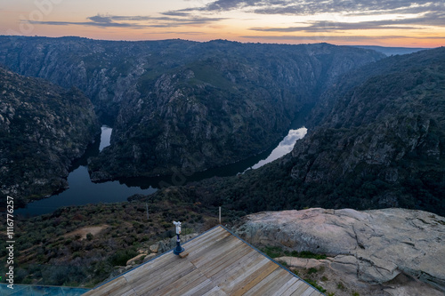 Amazing natural landscape with a panoramic view of the Douro River at sunset. Fraga do Puio viewpoint in the north of Portugal we can see the water running between the cliffs with a beautiful sunlight