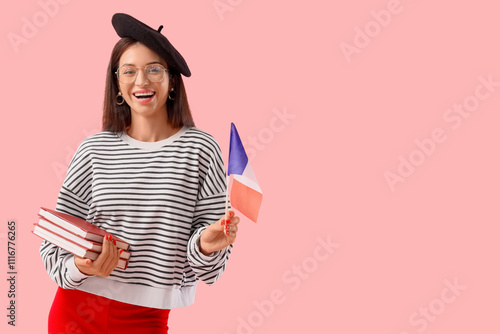 Young woman with books and ...