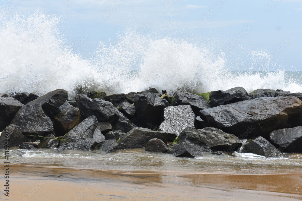 wave breaking on the rocks