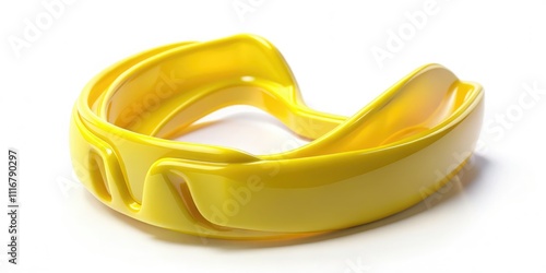 Vibrant yellow mouthguard against white backdrop provides athletes essential protective gear. Ideal for boxing and contact sports, aiding dental safety and enhancing performance during intense trainin photo