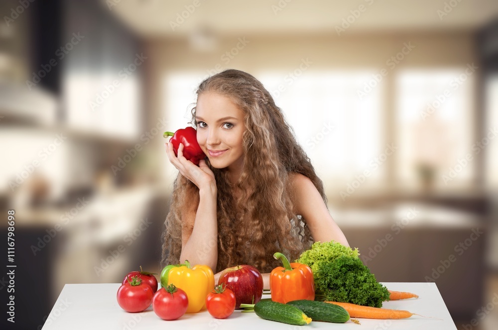 Portrait of beauty young woman cooking healthy food Portrait of beauty young woman cooking healthy food