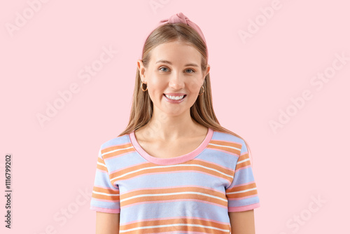 Beautiful young woman smili...