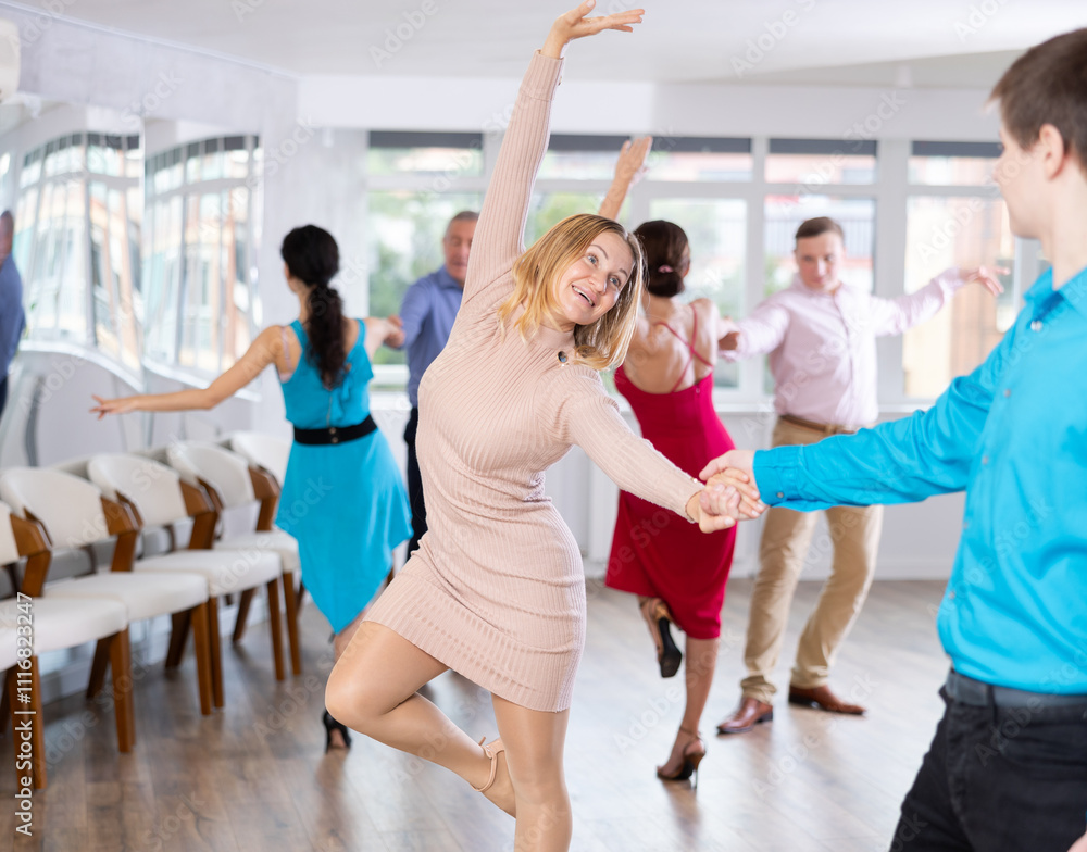 Fototapeta premium Adult woman rehearsing and dancing in dance class