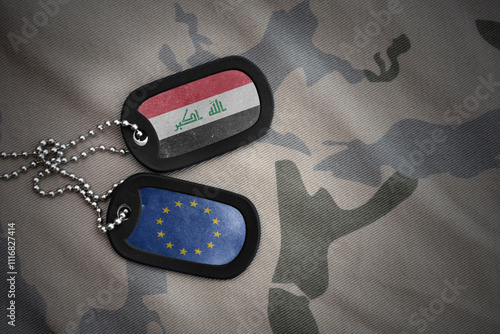 army blank, dog tag with national flag of iraq and european union on the khaki texture background. military concept. photo