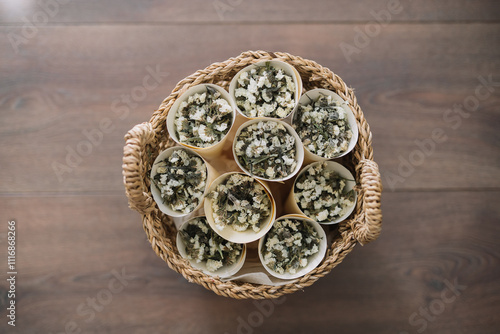 Basket of flower petals arranged in paper cones