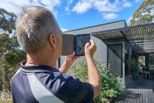 Building Inspector at work on residential property photo