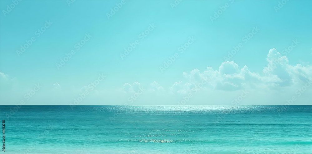 A serene seascape featuring calm turquoise waters and a clear sky with soft clouds. A serene seascape featuring calm turquoise waters and a clear sky with soft clouds.