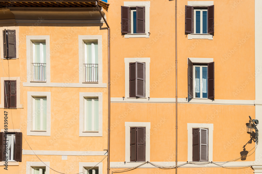 Old building's facade in Navona Square (Piazza Navona). Rome, Italy, 2017 Old building's facade in Navona Square (Piazza Navona). Rome, Italy, 2017