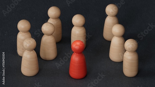 Foto A red wooden peg doll stands Isolated a group of white peg dolls on a dart board