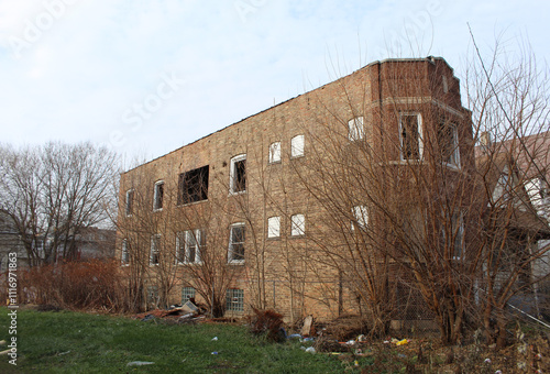 Abandoned three-flat apartment building in Englewood on Chicago's South Side photo