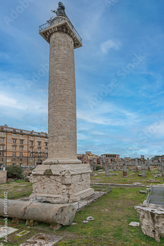 Trajan's Column is a Roman triumphal column that commemorates Roman emperor Trajan's victory in the Dacian Wars, built in AD 113, with 30 meters in height, in Carrara marble. Rome, 2017