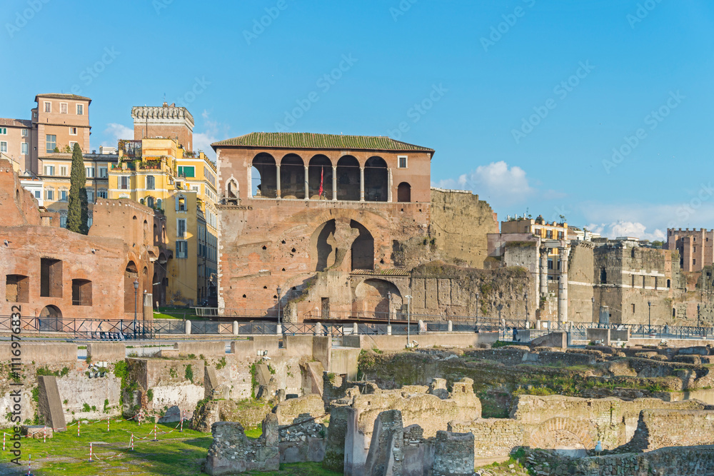 Fototapeta premium Trajan's Market, a complex of ruins at Via dei Fori Imperiali, example of Ancient Roman architecture, the world's oldest shopping mall built in 113 AD by architect Apollodorus of Damascus. Rome, 2017