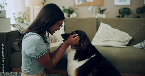 Happy woman, care and play with dog in home for love, loyalty or bonding. Pet animal, smile or friends in living room for support, nose touch and Indian girl scratch cute english shepherd in adoption photo