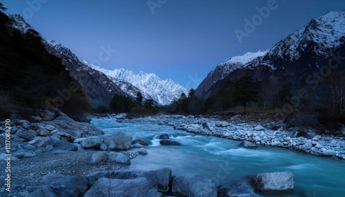 Nocturnal stream slips between sleeping stones, cold currents carrying mountain's midnight breath, silent and mysterious under starlit skies.