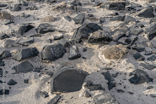 Obsidian Butte on the south shore of the Salton Sea. Calipatria, Imperial County, California. The Salton Buttes lie within the Salton Sea Geothermal Field. Rhyolite. dry lake bed. photo