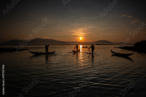 One morning on Nai Lagoon, Phan Rang, fishermen were fishing when the sun was high. Photo taken in Phan Rang on May 2, 2018. photo