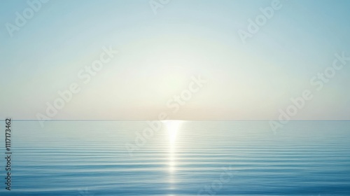 Serene sea view with gentle waves and sunlight.