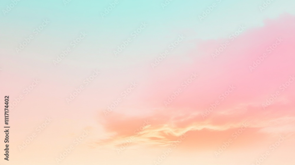 Obraz premium Soft pastel sky at dawn with gentle clouds.