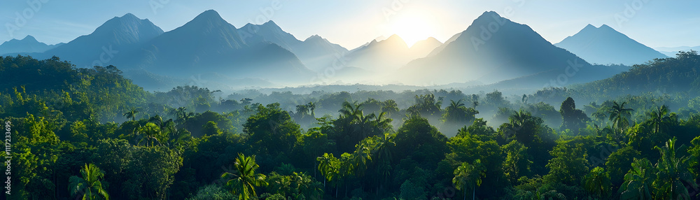 Misty sunrise over lush jungle valley and mountain range. Misty sunrise over lush jungle valley and mountain range.
