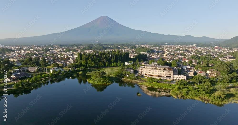 AERIAL Kawaguchi lake, Fujikawaguchiko town and Mt Fuji in calm morning in Japan AERIAL Kawaguchi lake, Fujikawaguchiko town and Mt Fuji in calm morning in Japan