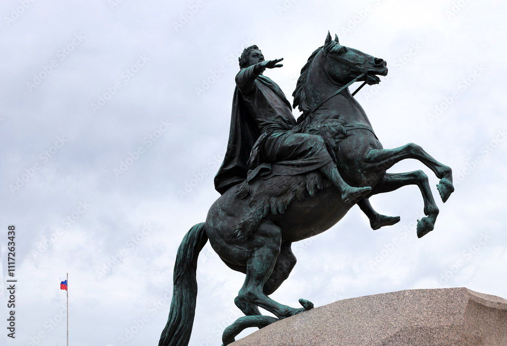 monument to the first Russian Emperor Peter the Great in St. Petersburg and the Russian flag. monument to the first Russian Emperor Peter the Great in St. Petersburg and the Russian flag.