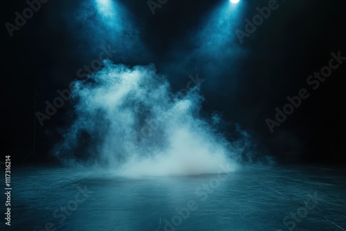 A misty stage illuminated by blue lights, creating a dramatic atmosphere for performances.