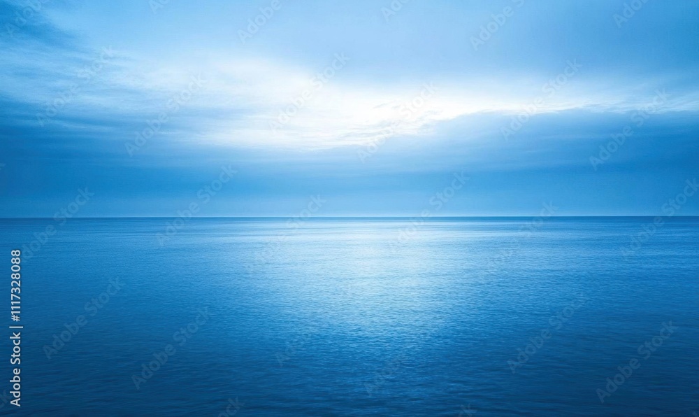 A serene ocean scene under a cloudy blue sky, evoking tranquility. A serene ocean scene under a cloudy blue sky, evoking tranquility.