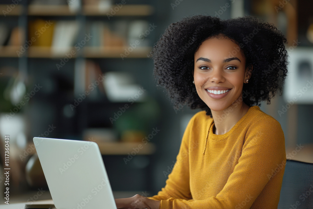 Young happy business woman company employee sitting at desk working on laptop Young happy business woman company employee sitting at desk working on laptop