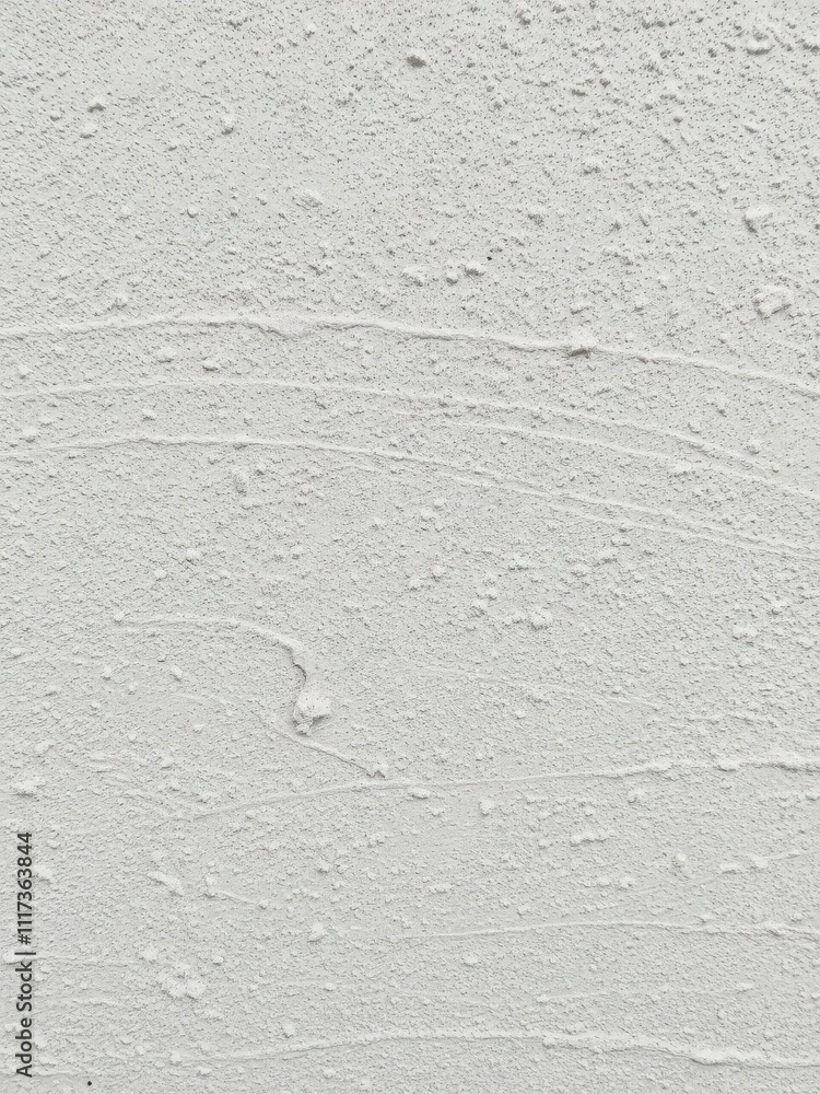 Close-up of a wall covered in rough, textured paint, detail, decorative