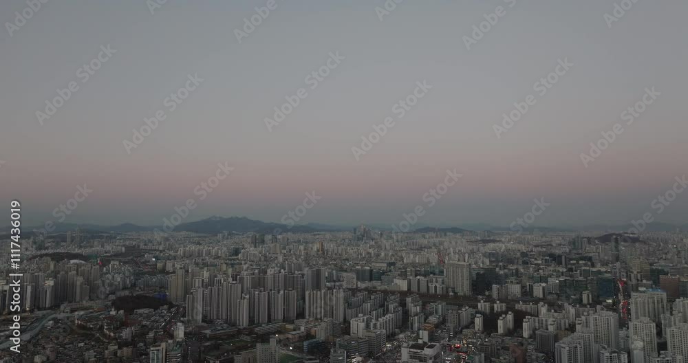 Aerial View of Seoul's Dense Urban Landscape at Sunset Aerial View of Seoul's Dense Urban Landscape at Sunset