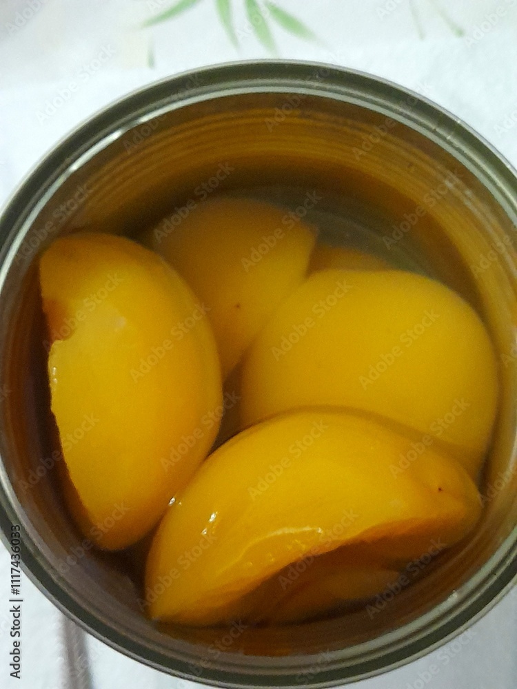 Preserved peaches in a can Preserved peaches in a can