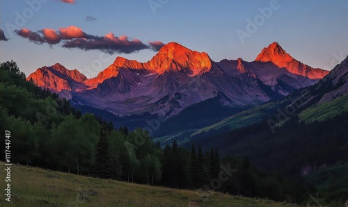 Majestic mountain range at sunset, showcasing vibrant colors and serenity.