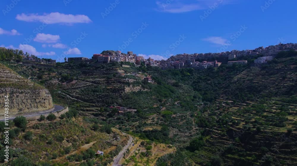 Aerial ascending view of the town of Centuripe in Sicily Aerial ascending view of the town of Centuripe in Sicily