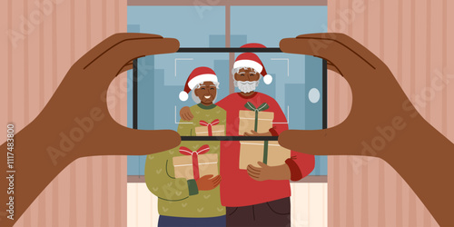 Person taking a photo of seniors couple in Santa hats. Christmas celebration and family concept. Hands with phone camera. Domestic life. Vector template.