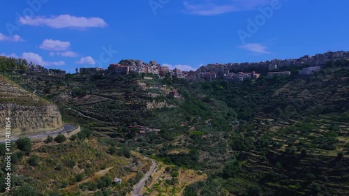 Aerial ascending view of the town of Centuripe in Sicily photo