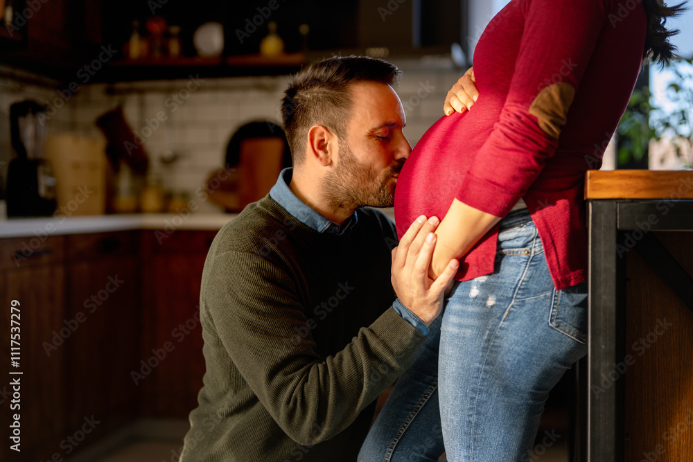 Man in love hugs his pregnant wife, they are waiting together for the baby's arrival. Love, family Man in love hugs his pregnant wife, they are waiting together for the baby's arrival. Love, family