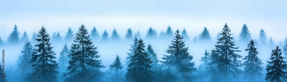 Naklejka premium A tranquil scene of misty blue-hued evergreen trees, creating a serene, atmospheric landscape.