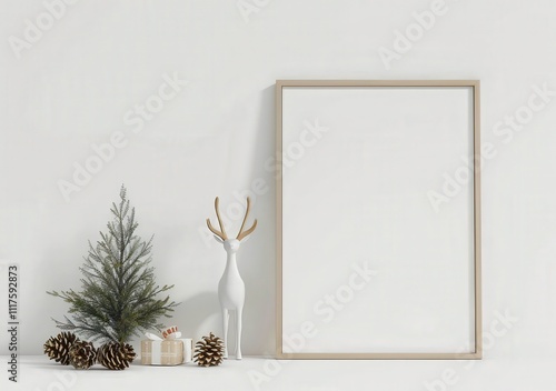 A white minimalist Christmas decor with a blank poster frame. a white reindeer. pine cones. a mini Christmas tree. and a gift box